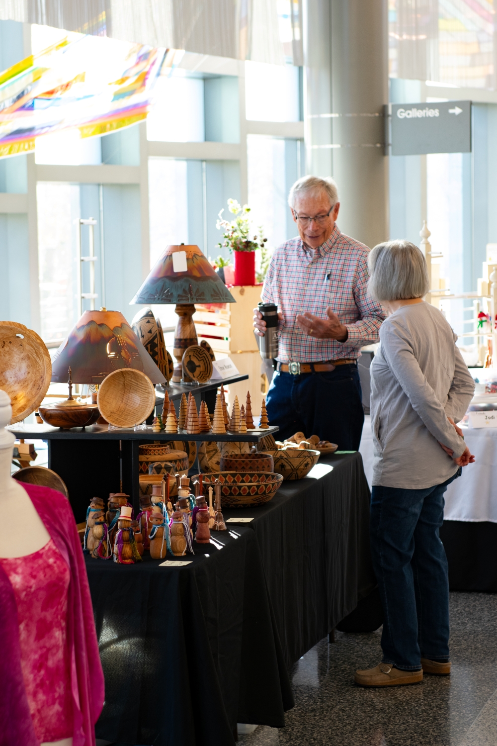 People looking at crafts 